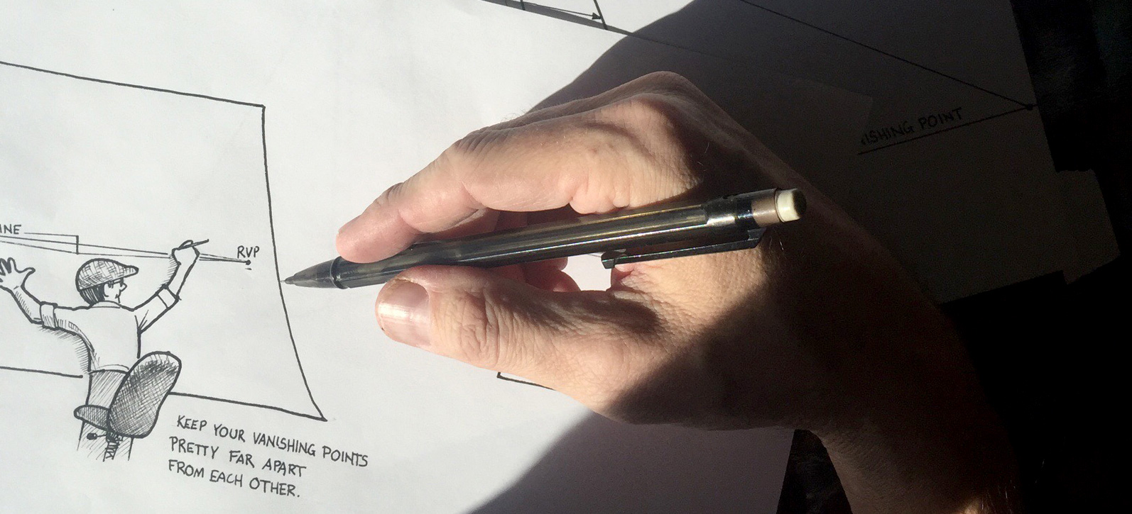 Artist sketching perspective with pencil