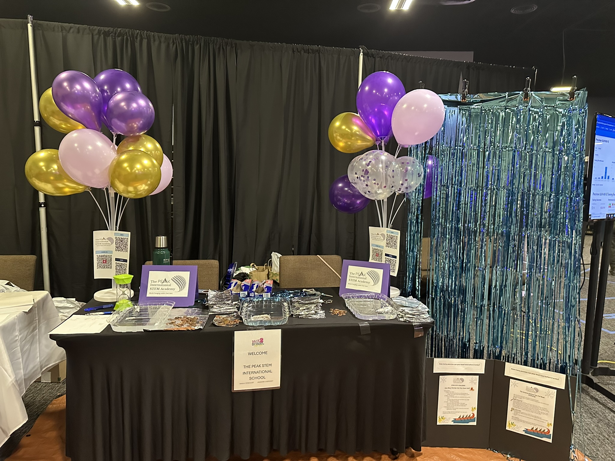 The Peak STEM International Academy booth setup at Back to School Fest, July 19, 2025