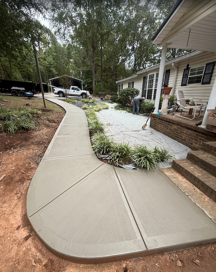 Curved Broom-Finished Concrete Walkway