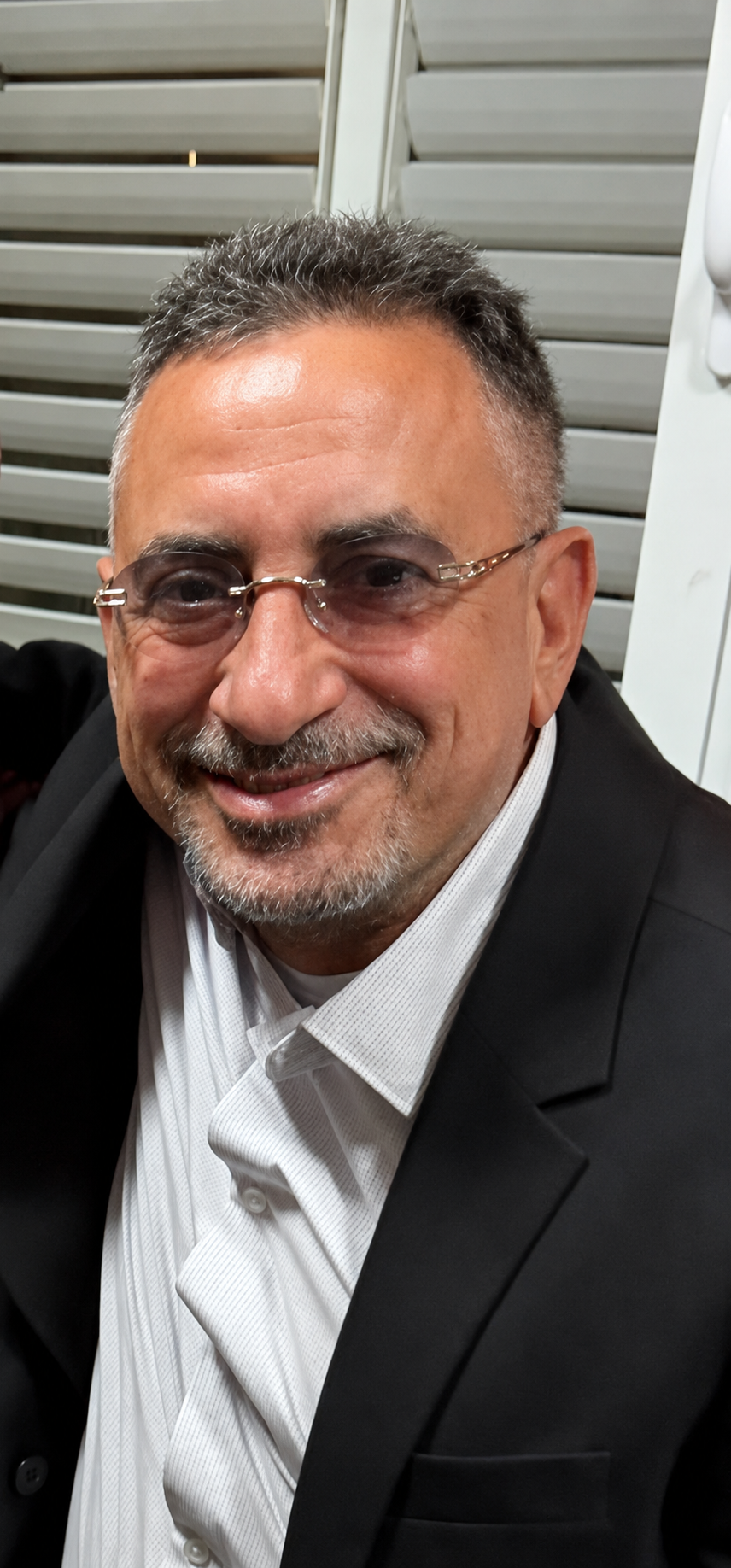 אריק מלכה, בעל העסק