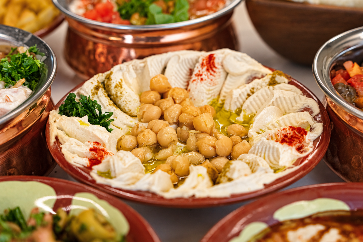 Authentic Levantine hummus bowl with chickpeas and spices