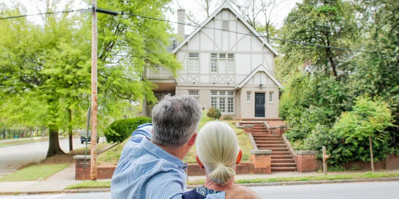 Couple looking towards their potential new home