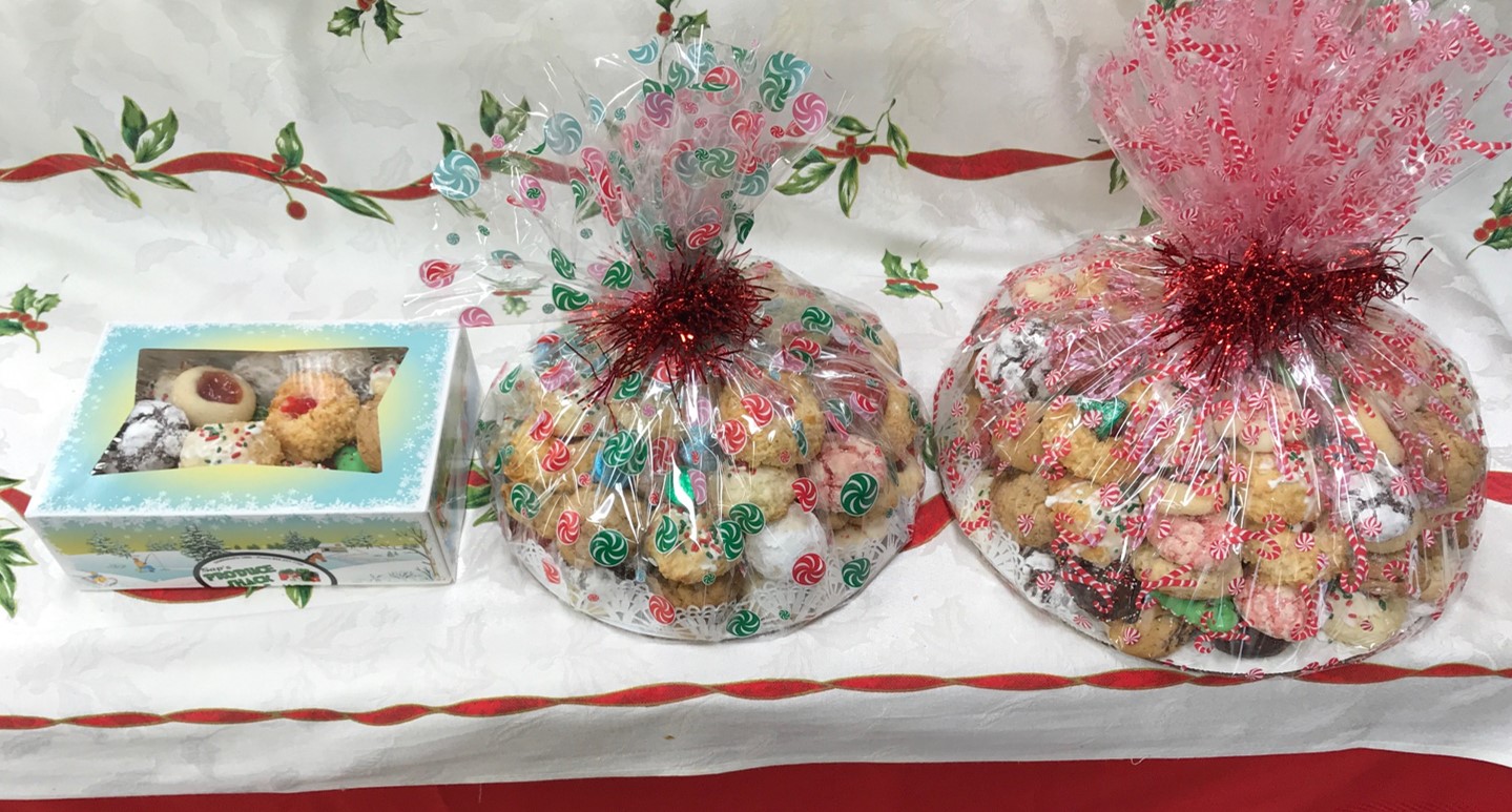 Sap's festive holiday cookie trays and gift boxes wrapped with cellophane and ribbons