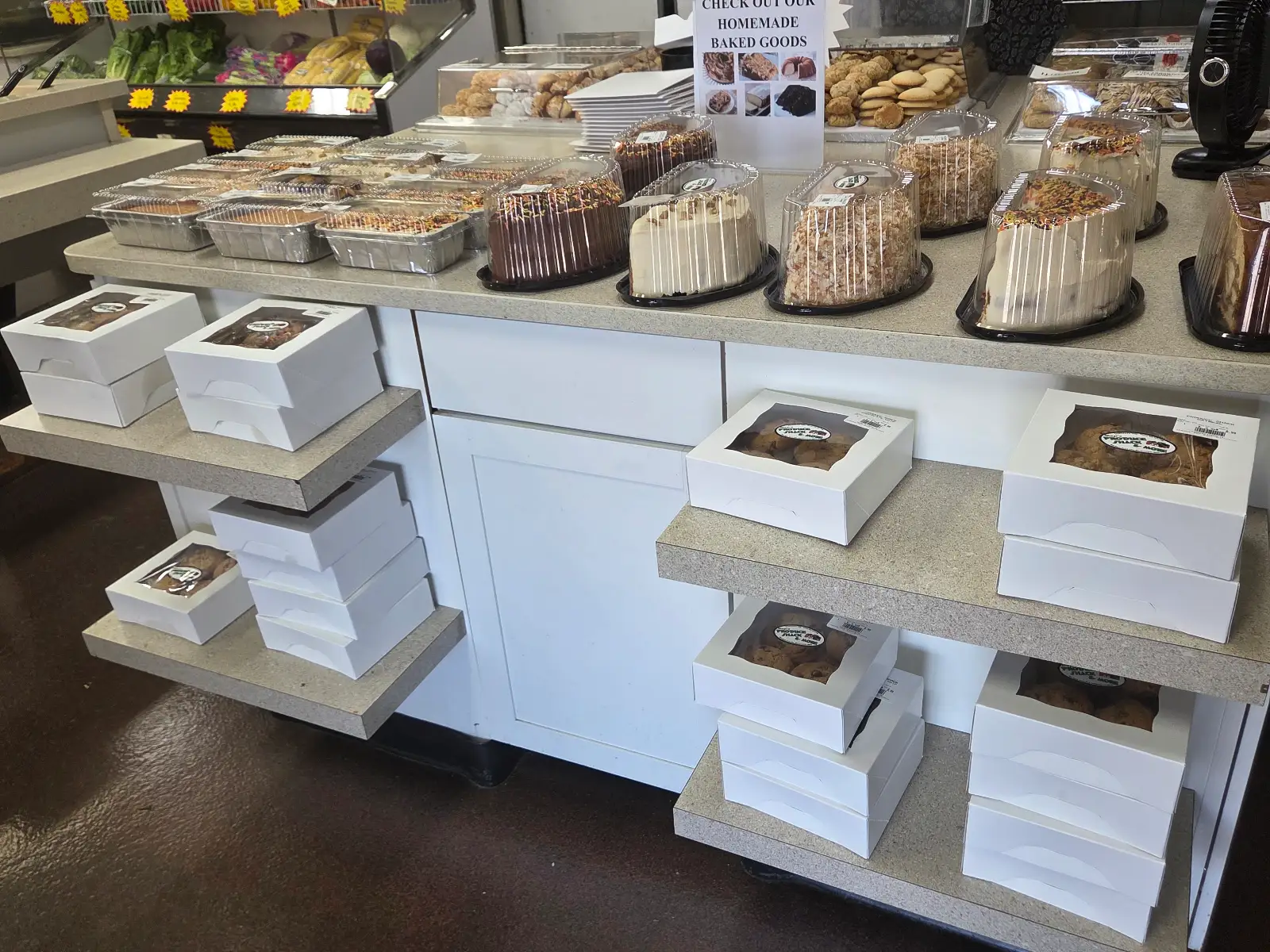 Sap's Produce Shack homemade baked goods counter with cakes and boxed treats