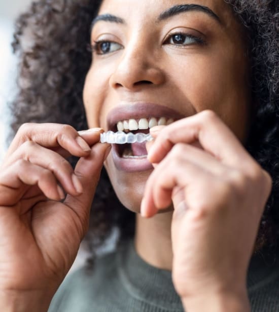 Patient with Invisalign clear aligner