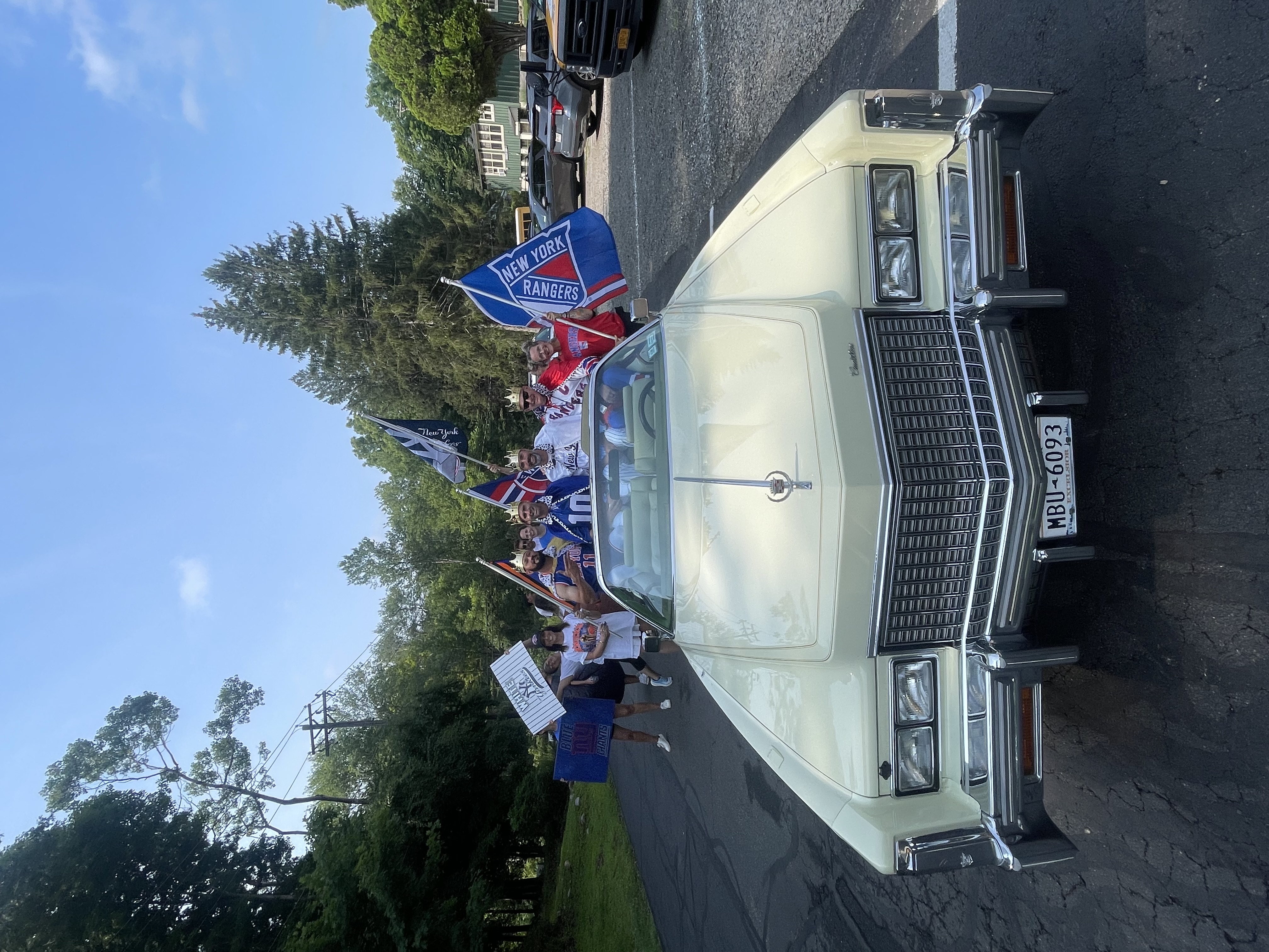 Classic Cadillac convertible restoration showcase with fans at Greg Zurla's Auto Body, Congers, NY