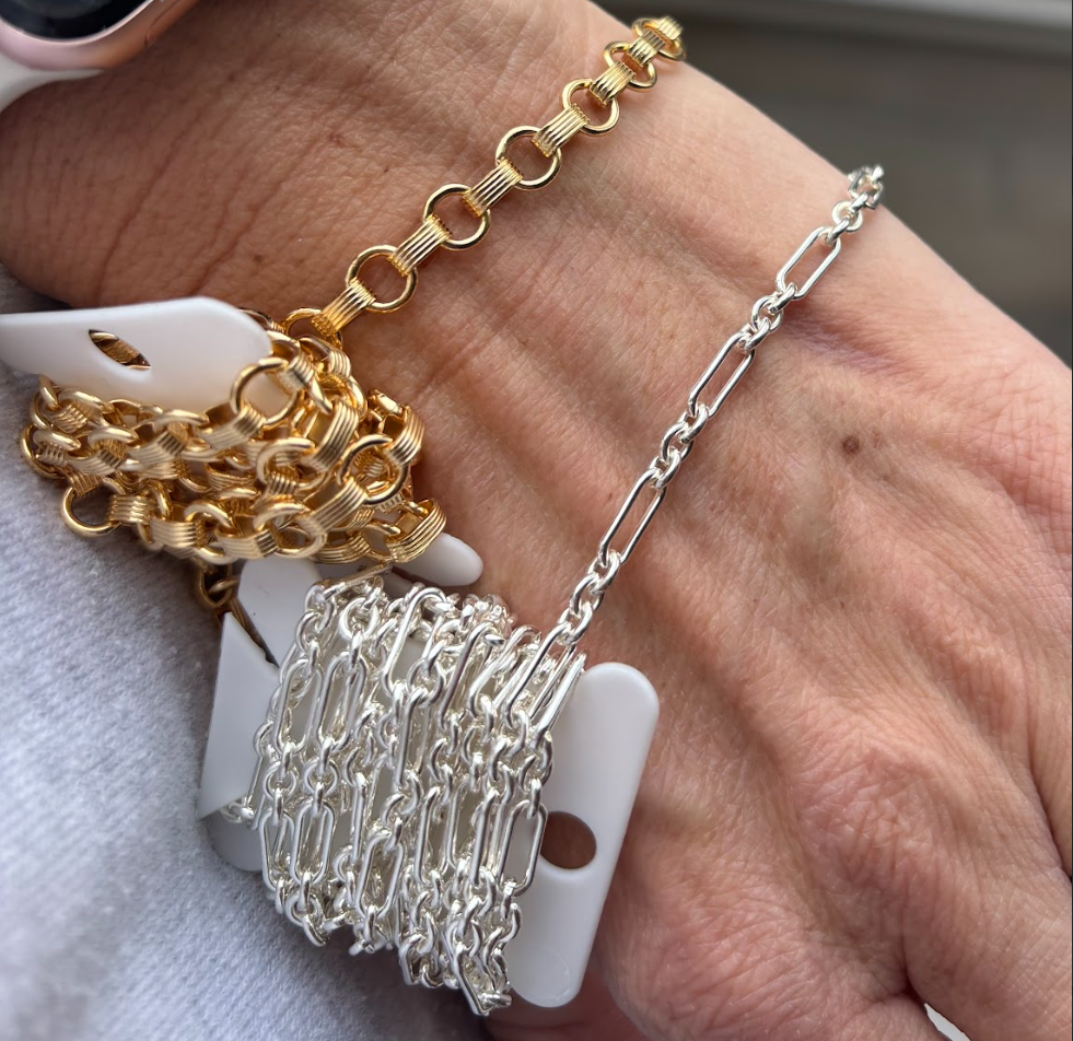 Gold and sterling silver bracelets with connector charms