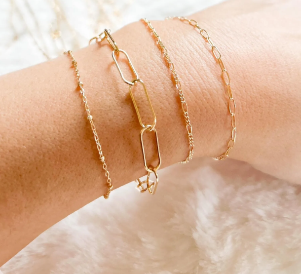 Permanent bracelets with personalized letter charms