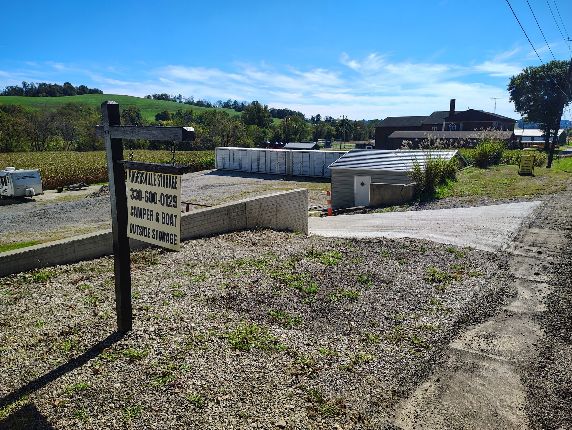 Front streetview of Ragersville Storage property, storage units, and peaceful surrounding farmland