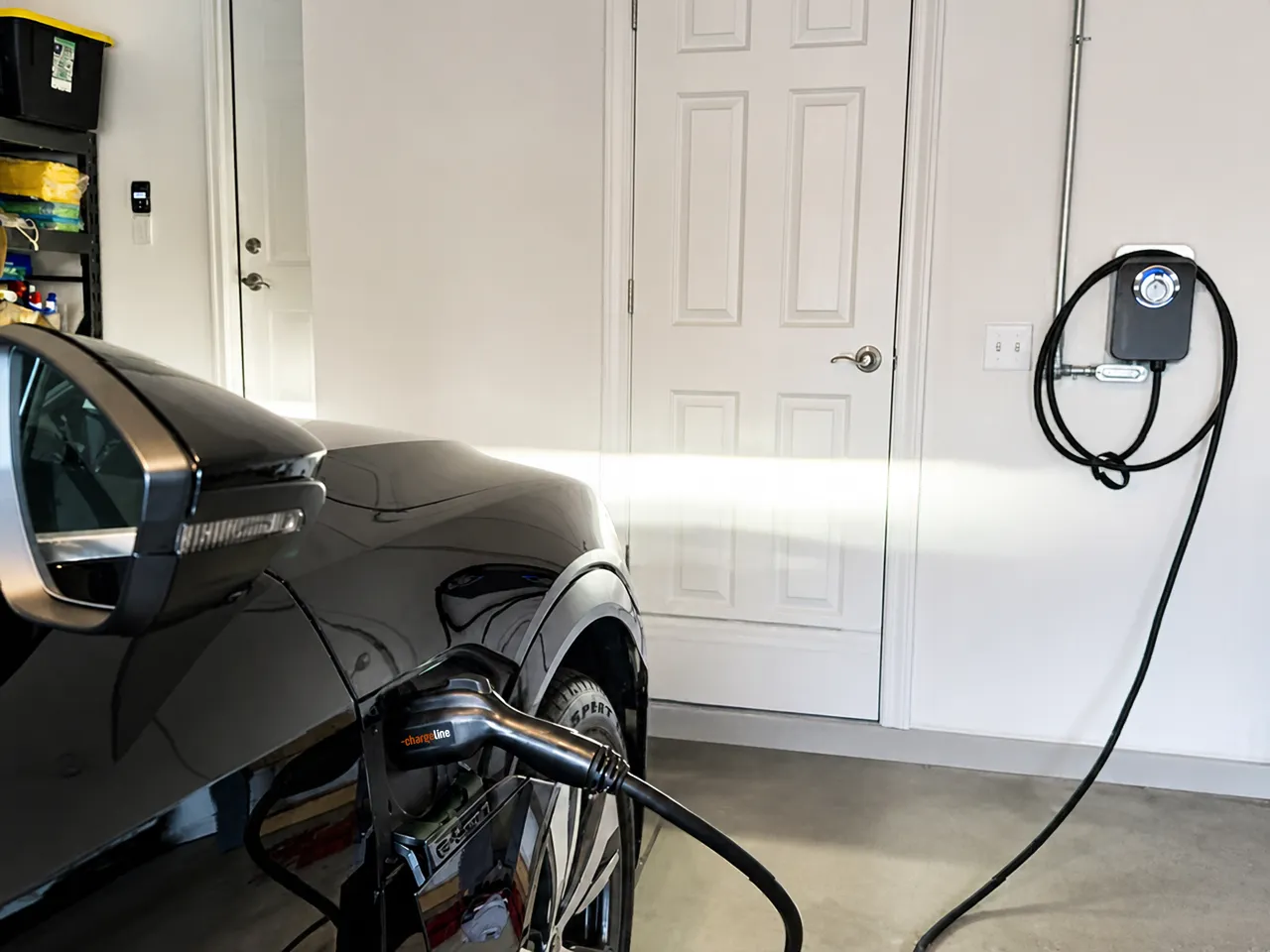 Electric vehicle charging from a Level 2 charger in a home garage