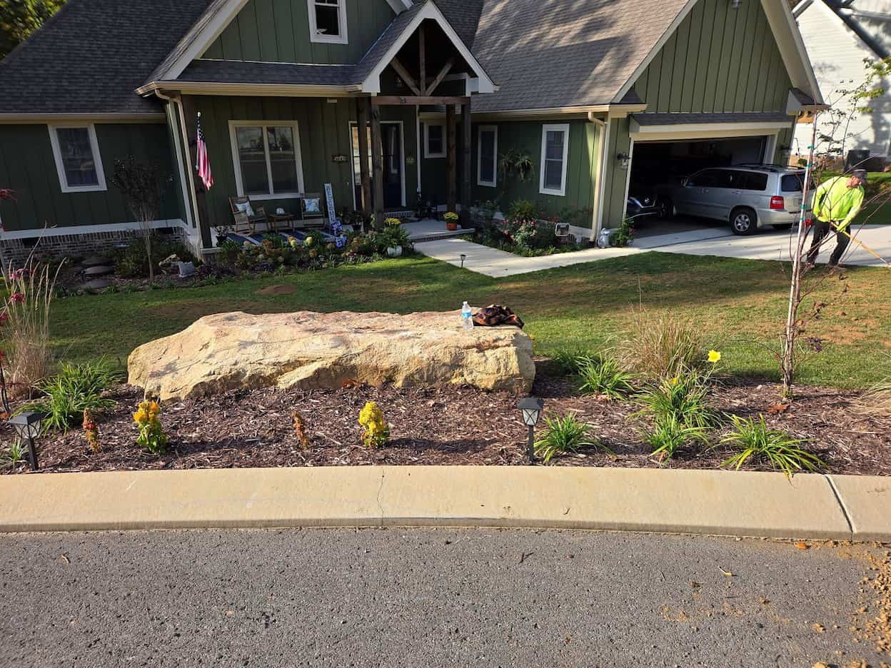 Lawn edging and sidewalk clearing on a residential Chattanooga, TN property