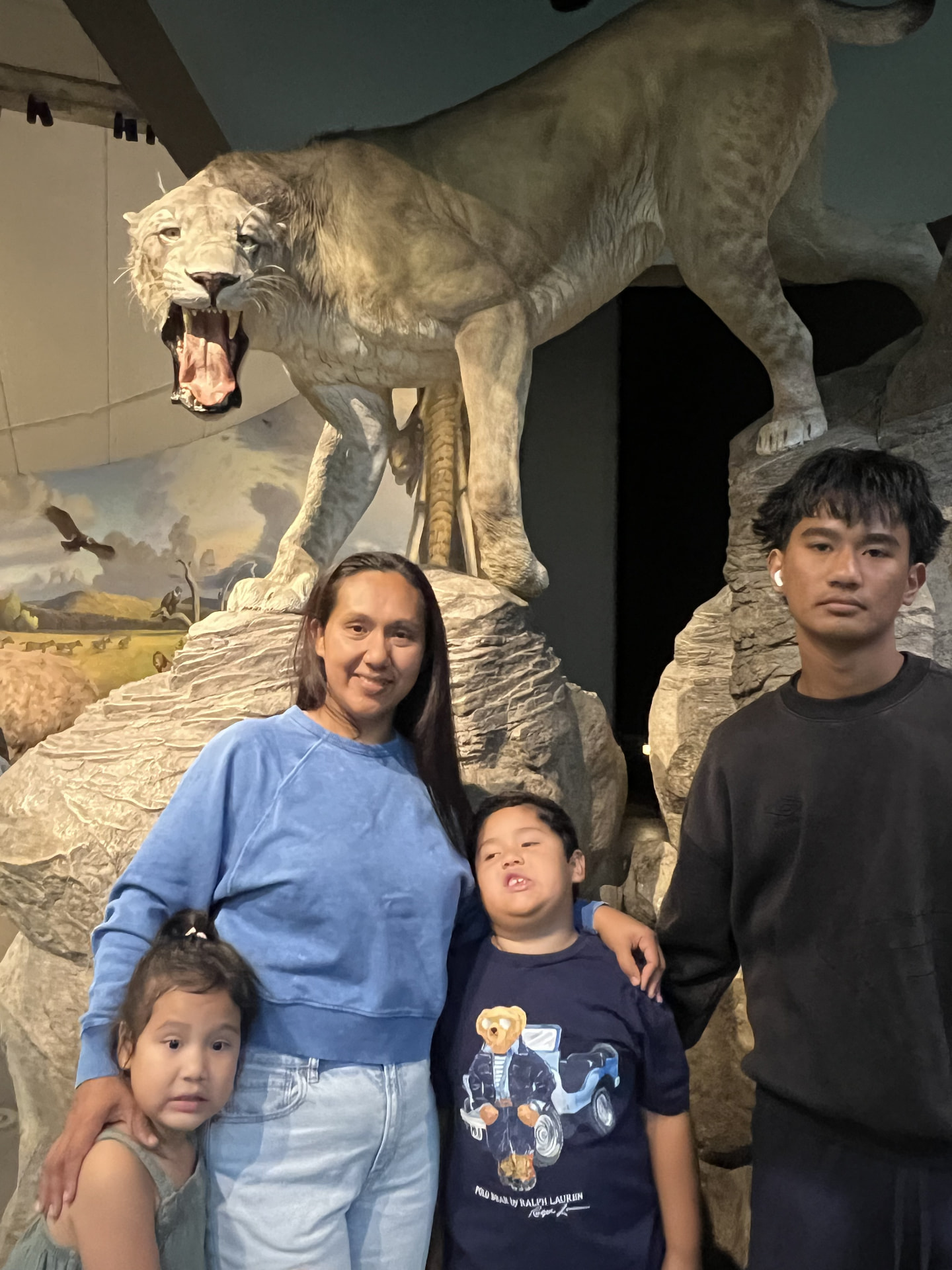 Dan Jenkins and family visiting an exhibit