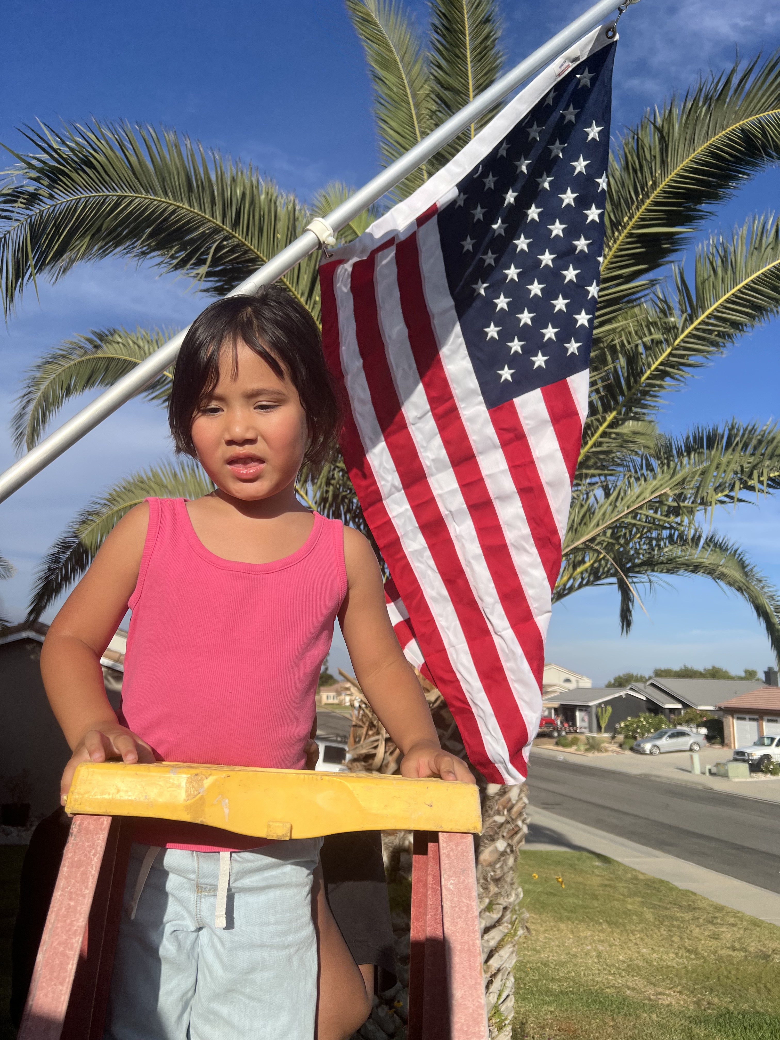Family member with American flag