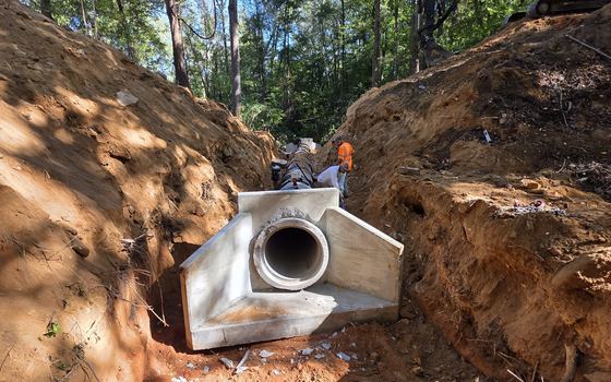 A concrete structure set into an excavated cut on a South Carolina site
