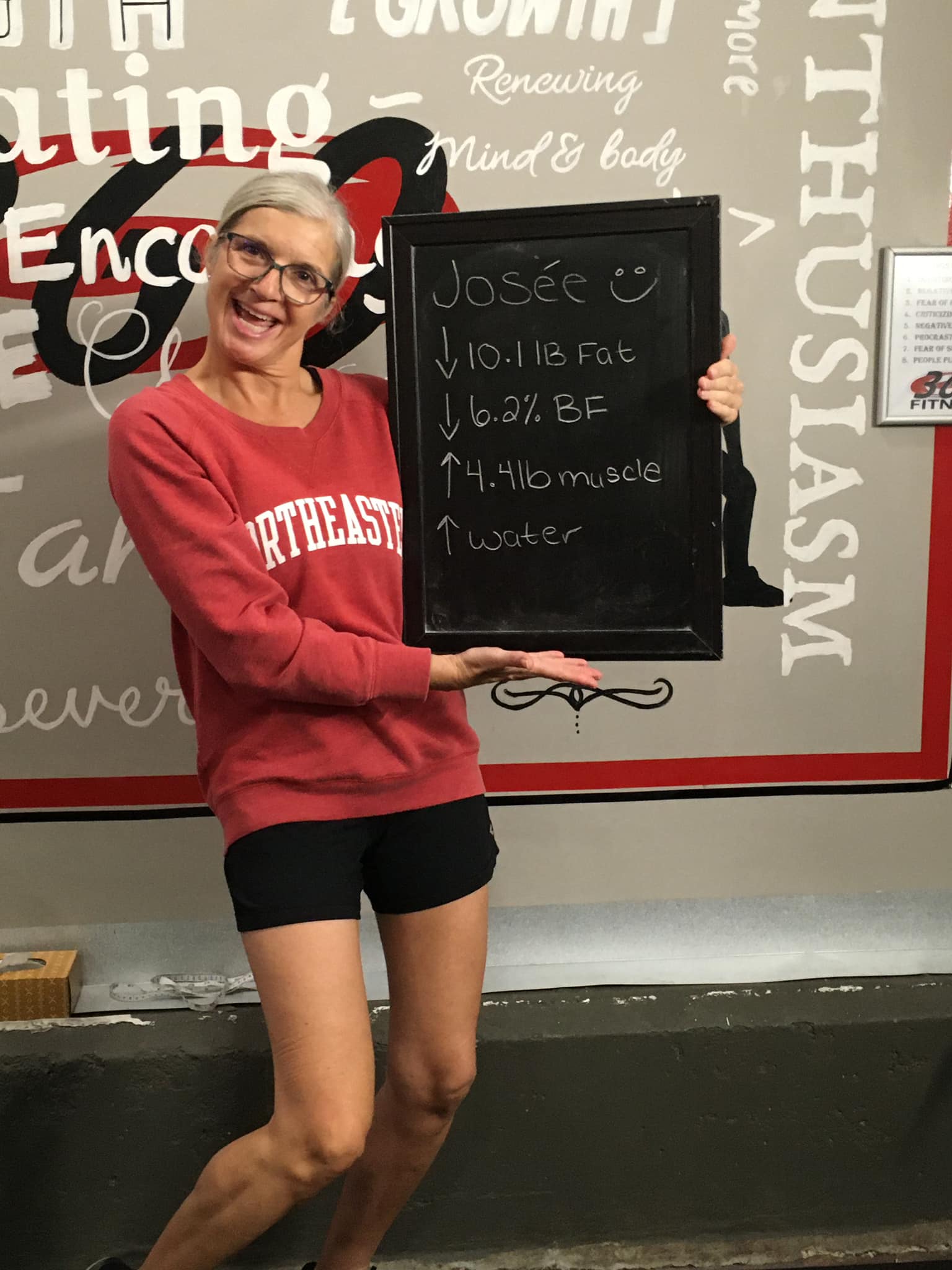 Josée holding chalkboard results at 360 Fitness Red Deer
