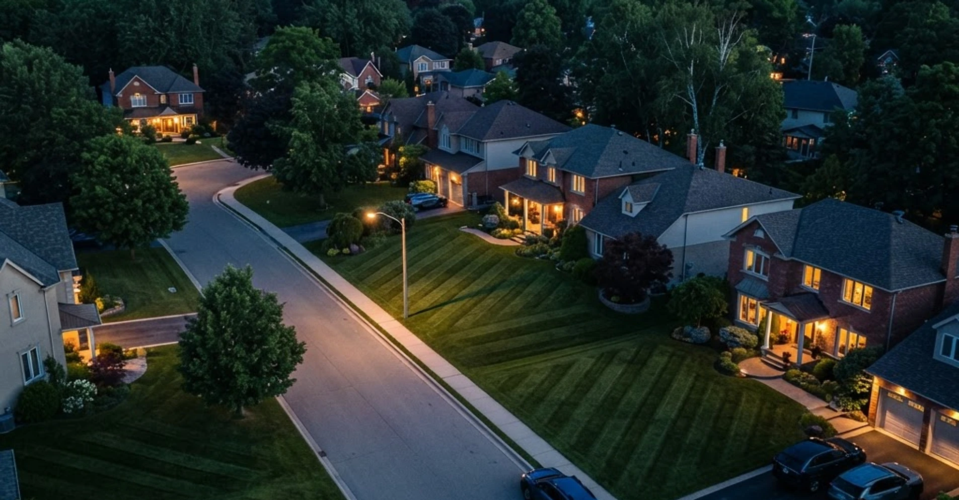 Aerial view of a residential street at dusk