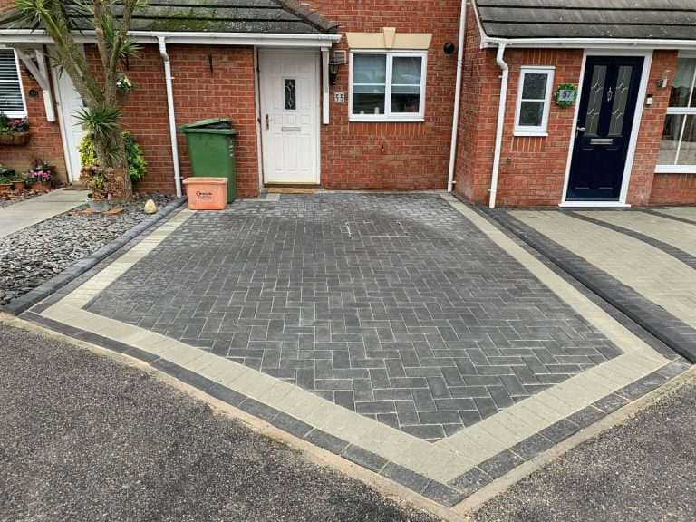 Charcoal block paved driveway with contrast border installed in Wickford Essex