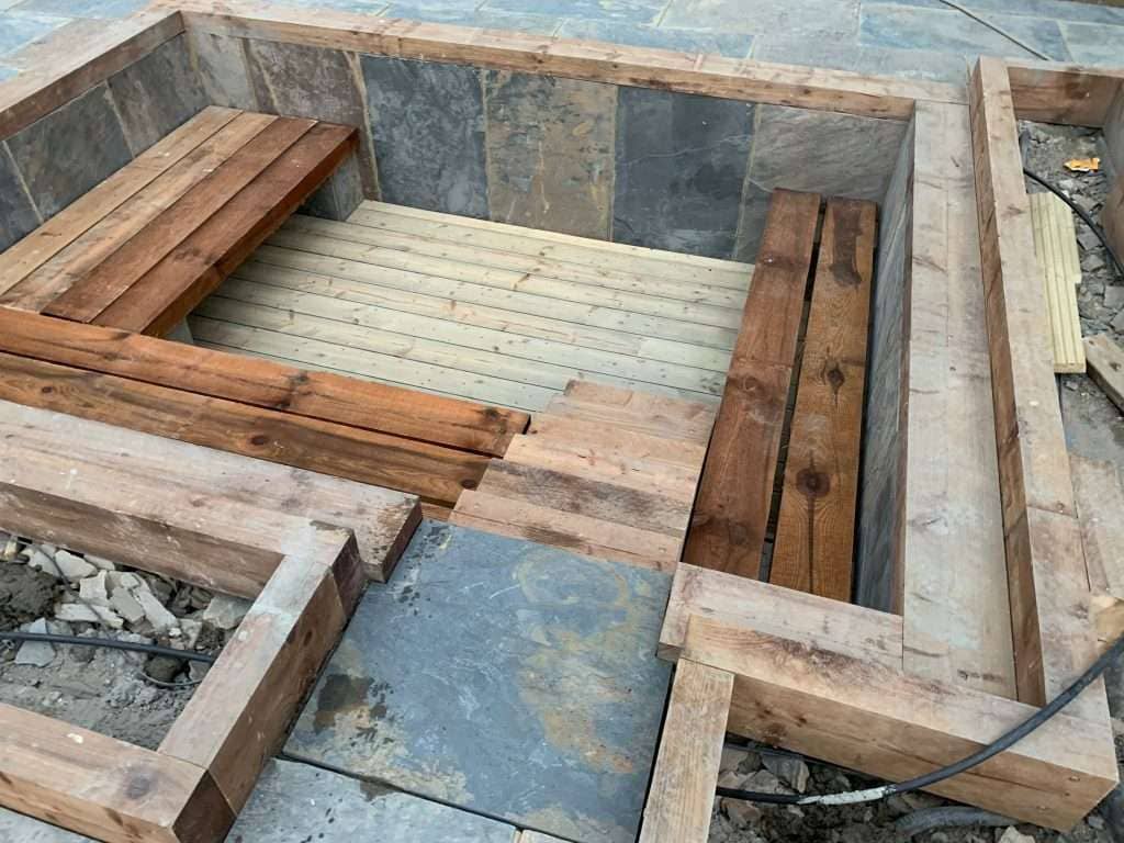 Railway sleeper seating and steps built in Basildon garden