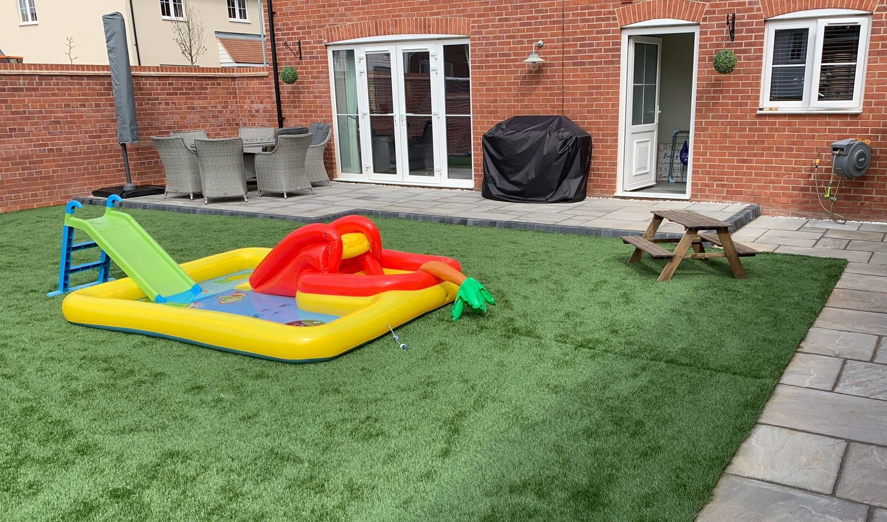 Low-maintenance artificial grass lawn in Rayleigh