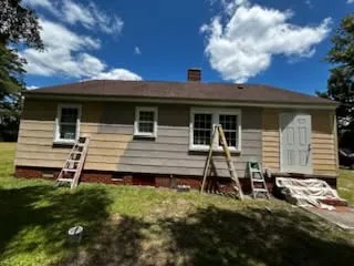Exterior Siding Halfway Transformation (In Progress)