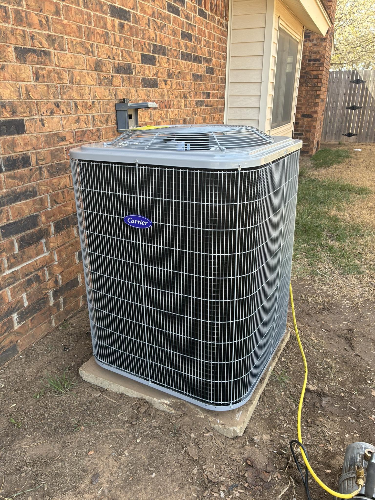 Carrier air conditioning condenser unit installed by Patrick Heating & Air in Amarillo TX