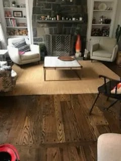 Spotless hardwood floor and living room