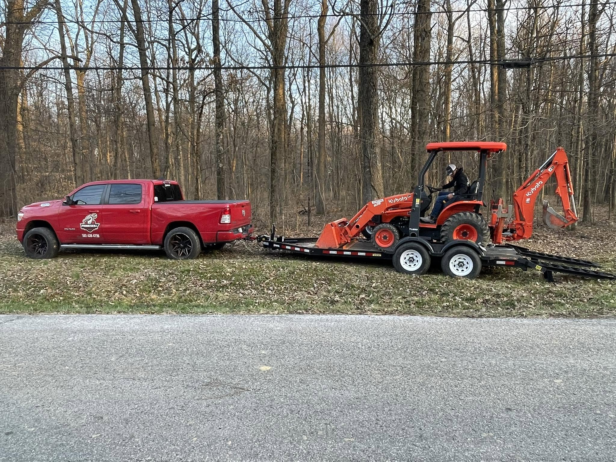 PrimeSkill truck, trailer and Kubota backhoe equipment