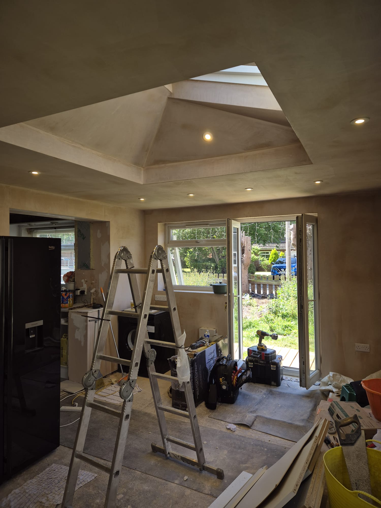 Rear house extension build with roof lantern recessed downlights and circuit wiring in progress