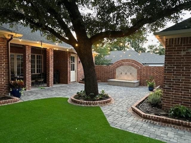 Paved patio and planting areas within a completed outdoor space