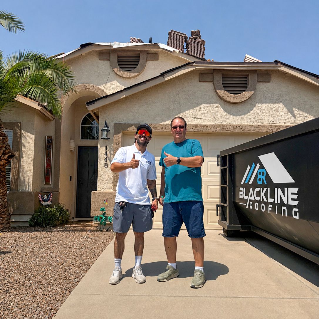 Happy homeowner with the Blackline Roofing team