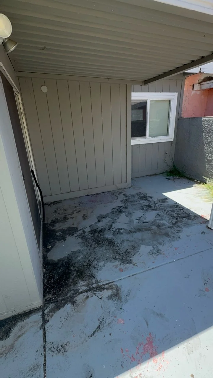 Covered patio with bags and boxes removed after a Chula Vista property cleanout.