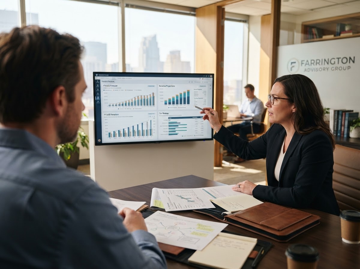 Meridian advisor reviewing a financial roadmap and forecasting dashboard with a business owner
