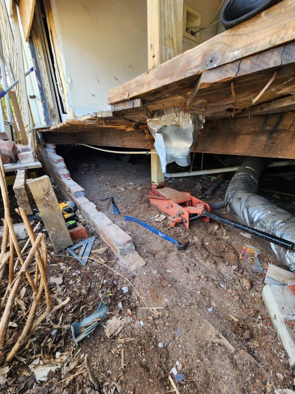 Water leak diagnosis, structural foundation jacking and subfloor repair