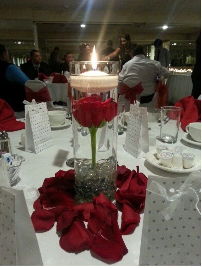Submerged Rose & Candle centerpiece decor by Vibrant Affairs LLC