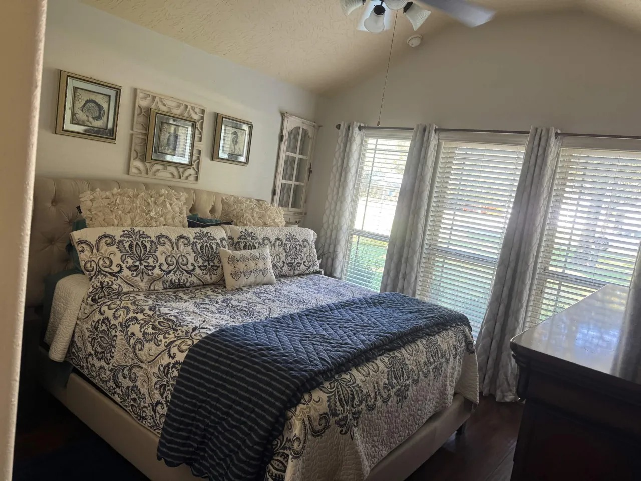 Deluxe Sunlit Suite with Pattern Bedding & Blinds