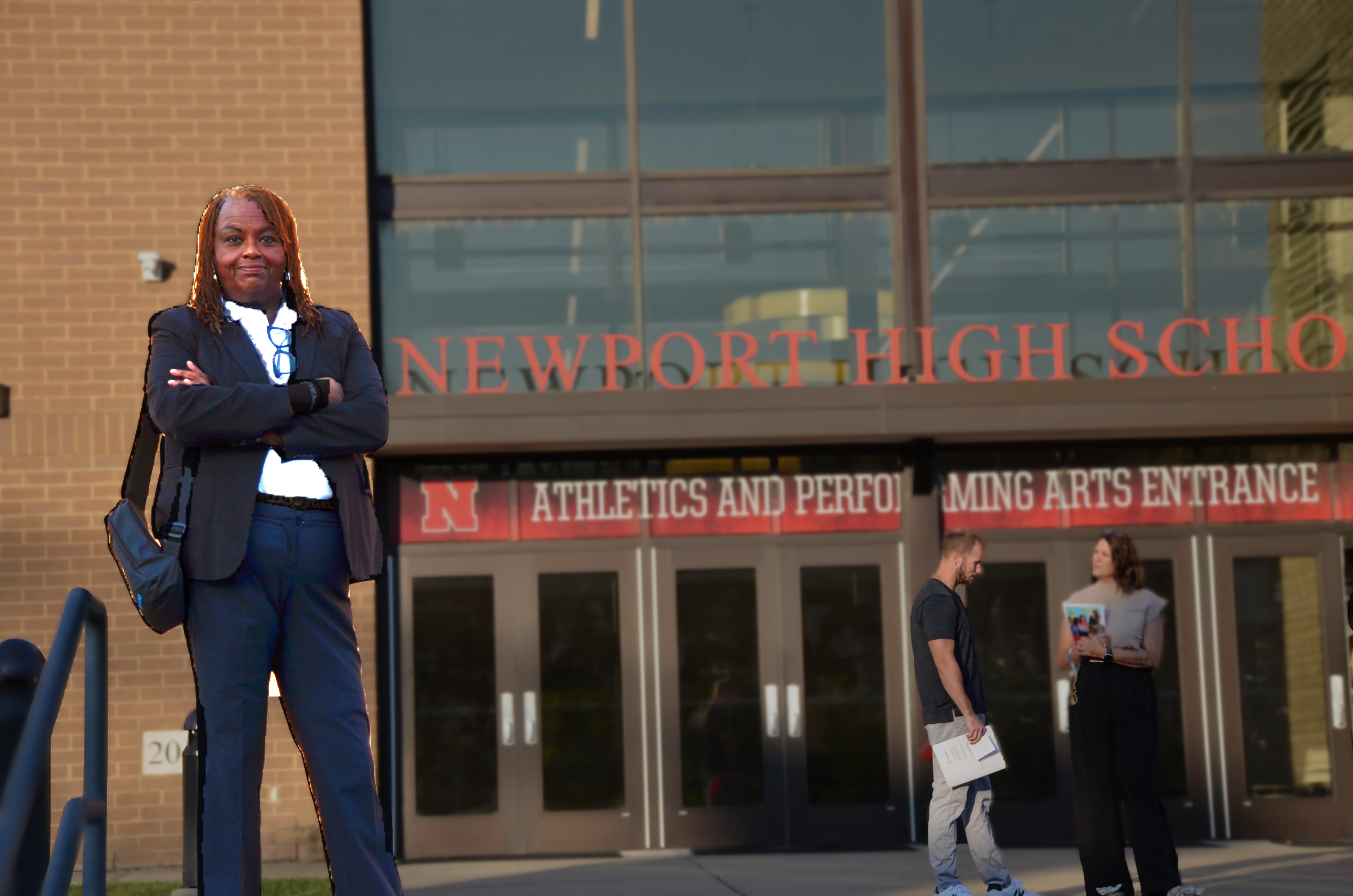 Dr. Long-Nelson outside Newport High School before consulting engagement