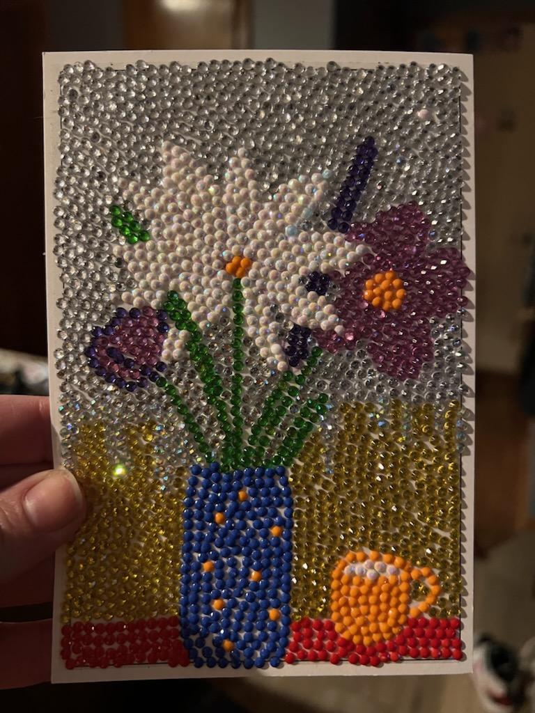 Handmade floral vase diamond painting with sparkling daisies, tulips, and tea cup