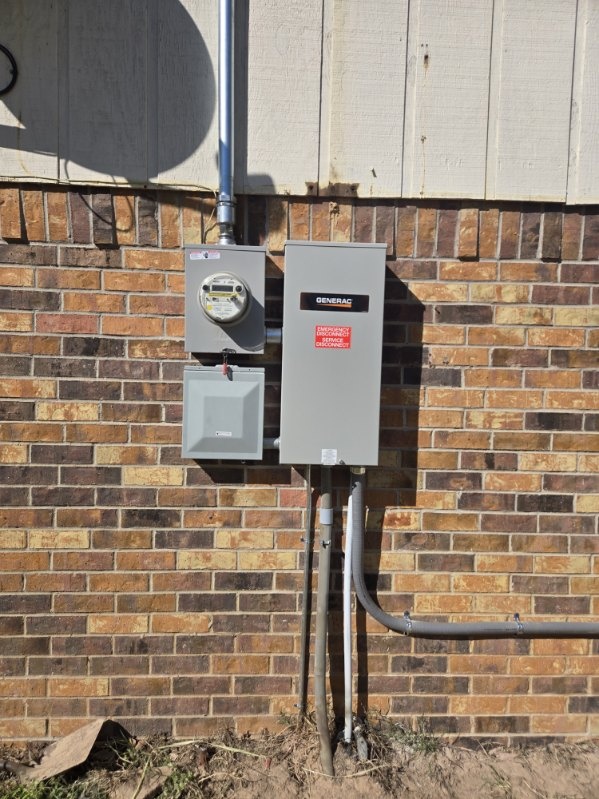 Electric meter, panel and Generac transfer switch installed by Rieger Electric