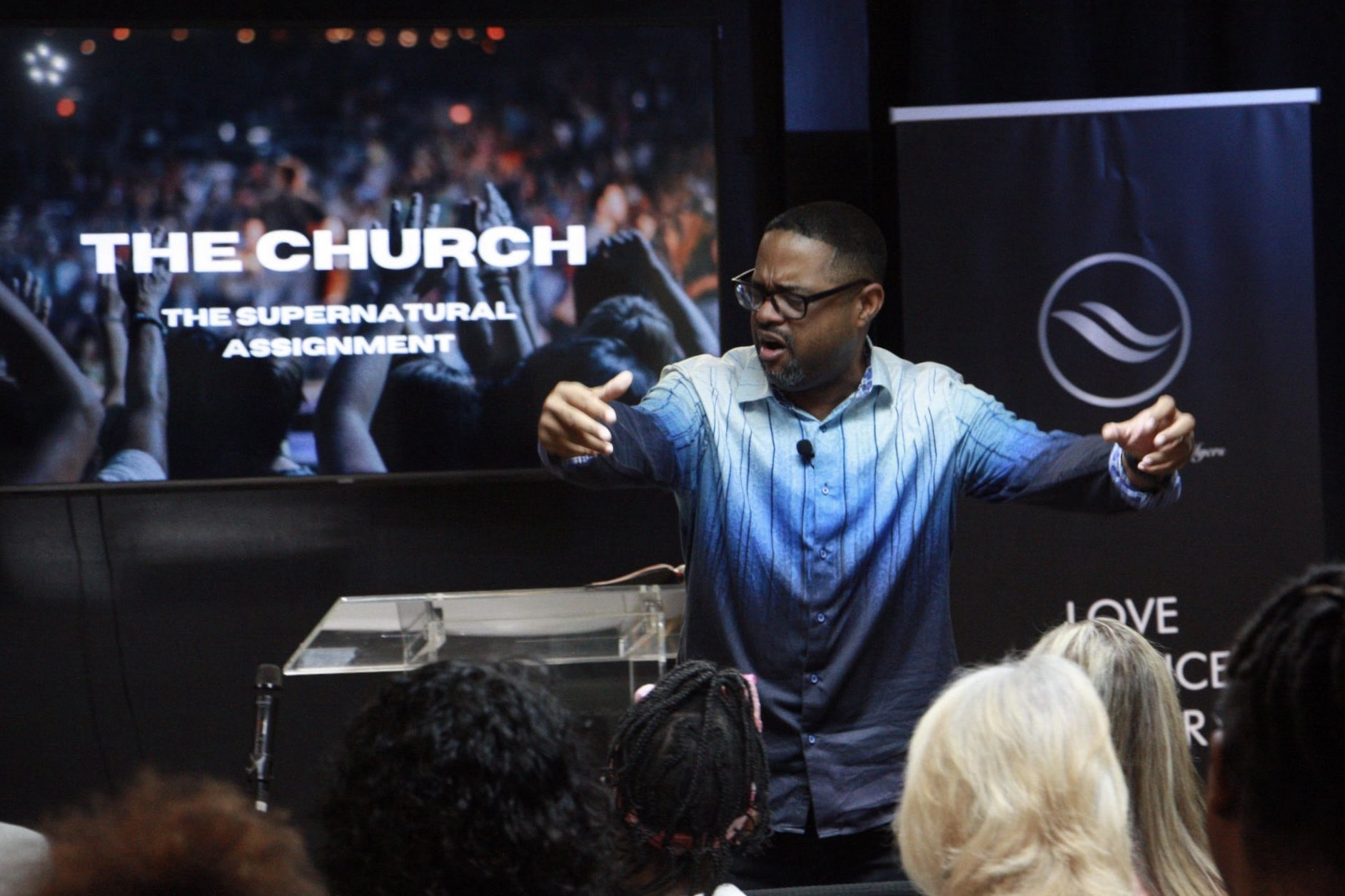 Pastor Daniel Williams preaching at The River Church at Fort Myers