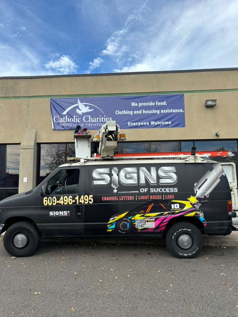 Signs Of Success Work Van · Fleet Lettering & Graphics