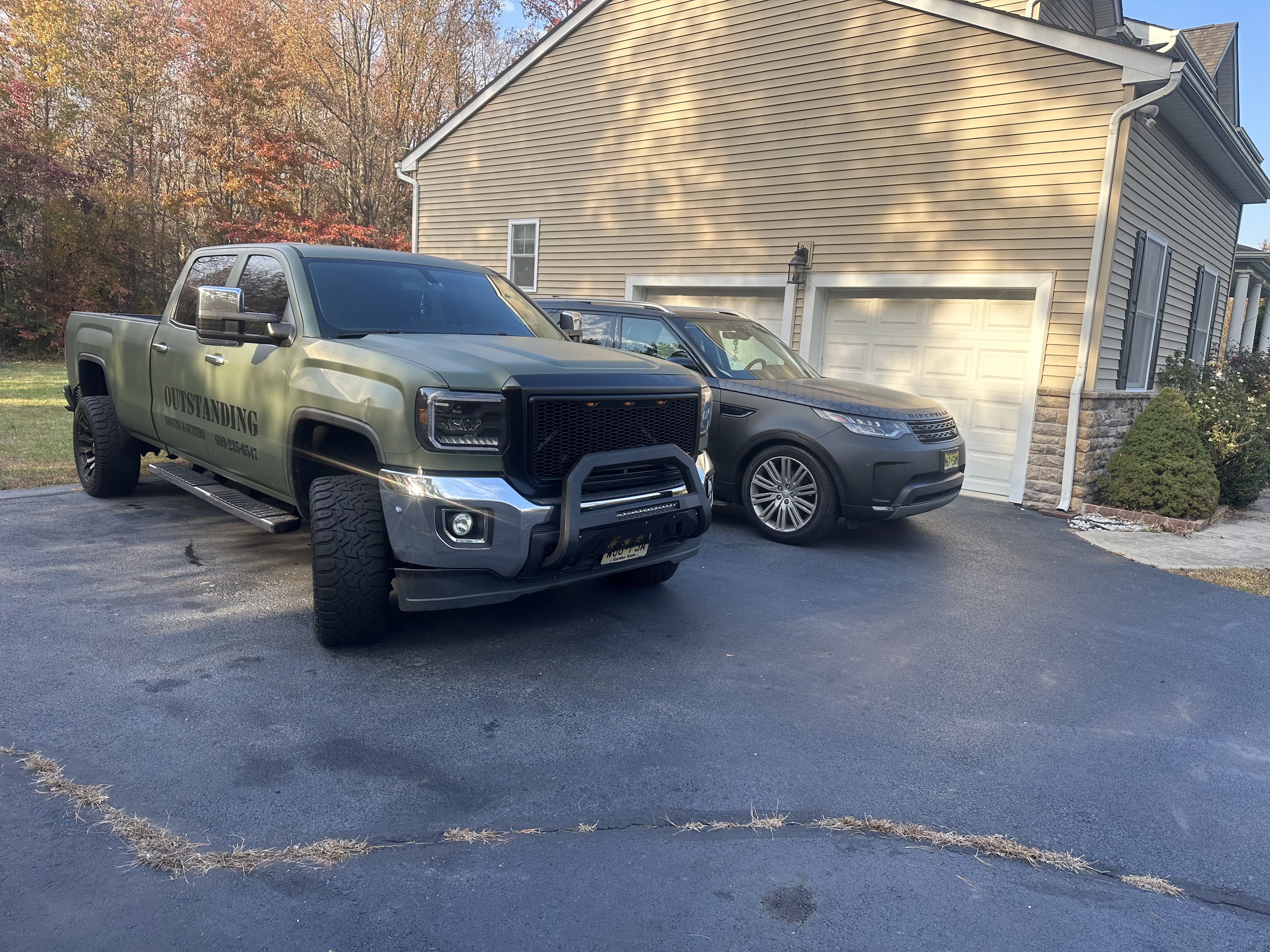 GMC Sierra 2500HD · Outstanding Roofing Matte Olive Wrap