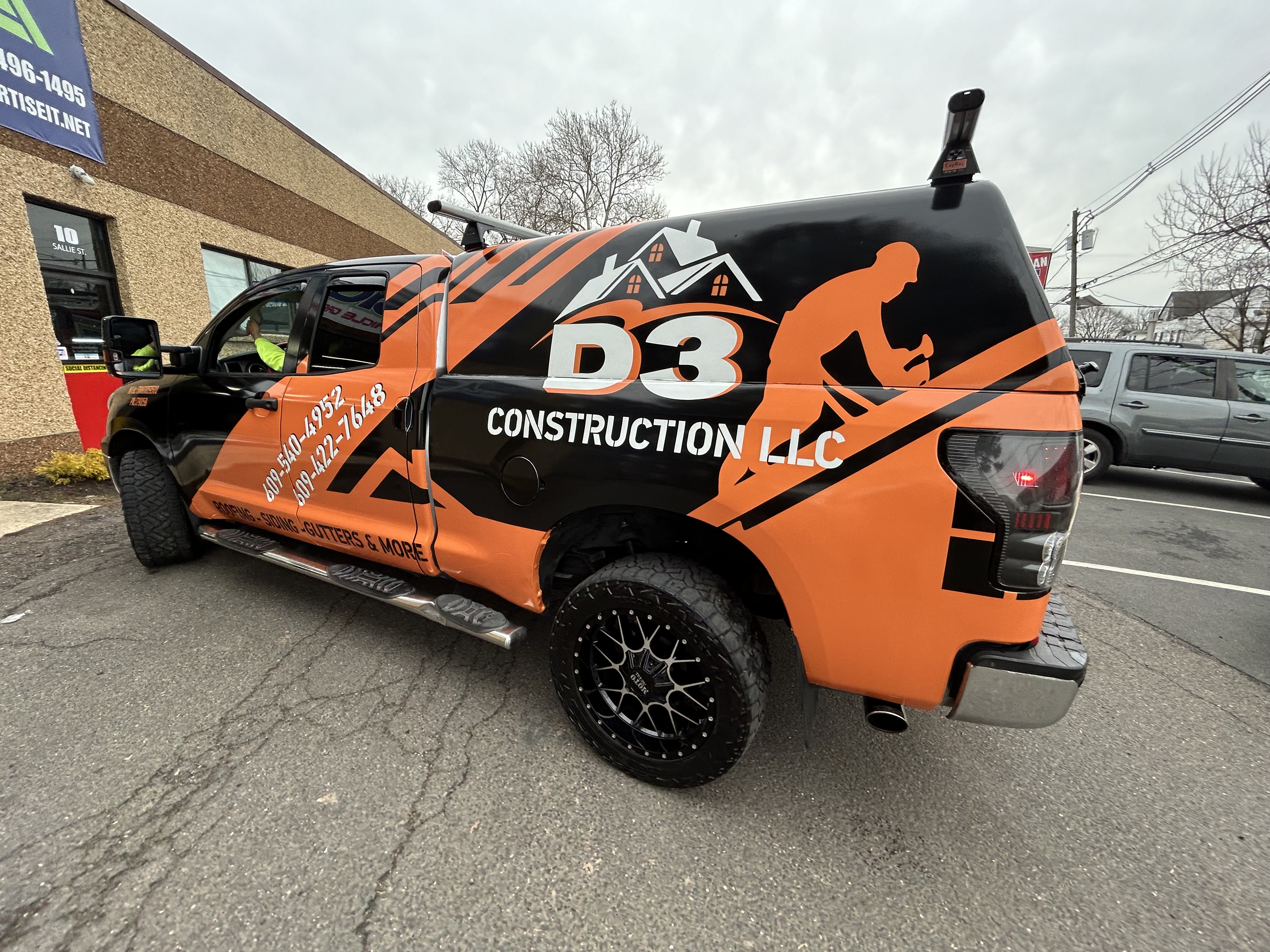 Ford F-150 + Cap · D3 Construction Custom Wrap