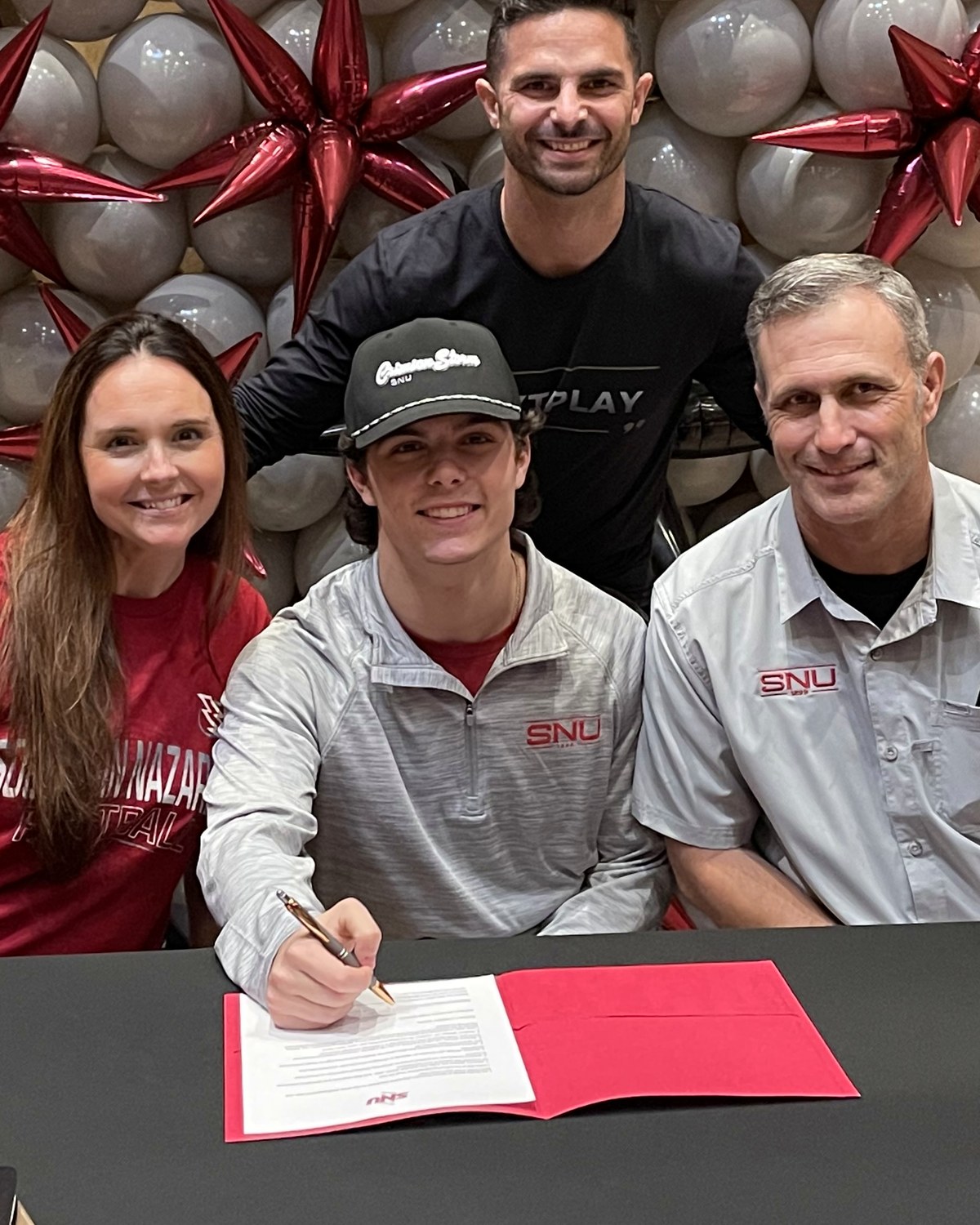 Richie Contartesi with commit and family signing official NLI