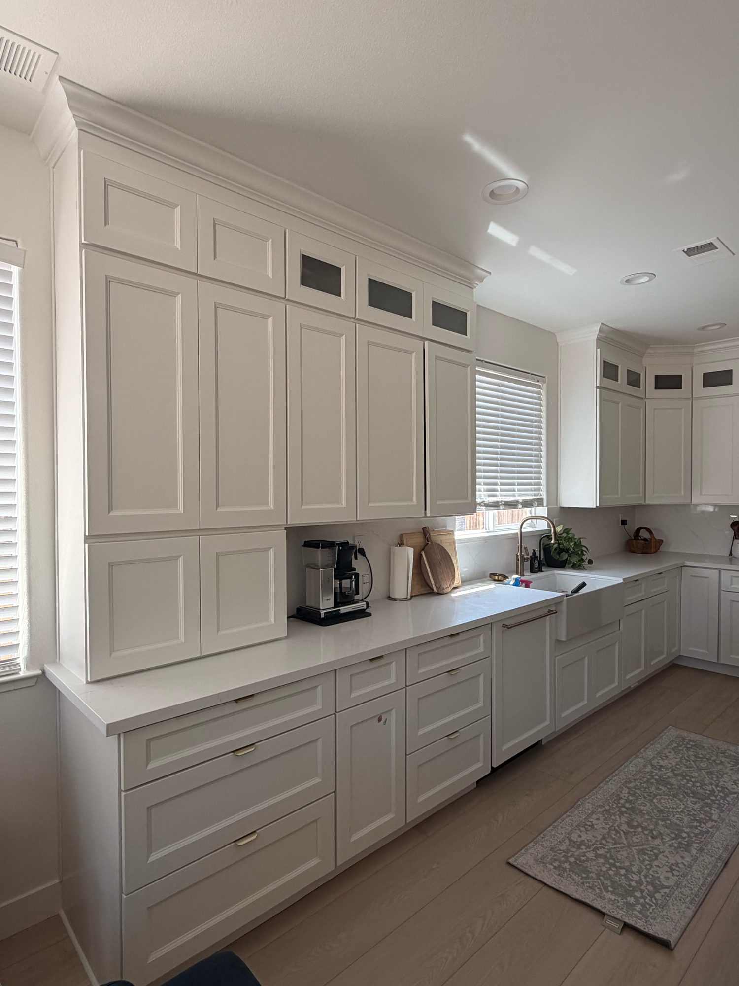 White shaker cabinets and quartz countertops along pantry wall, Reno, NV