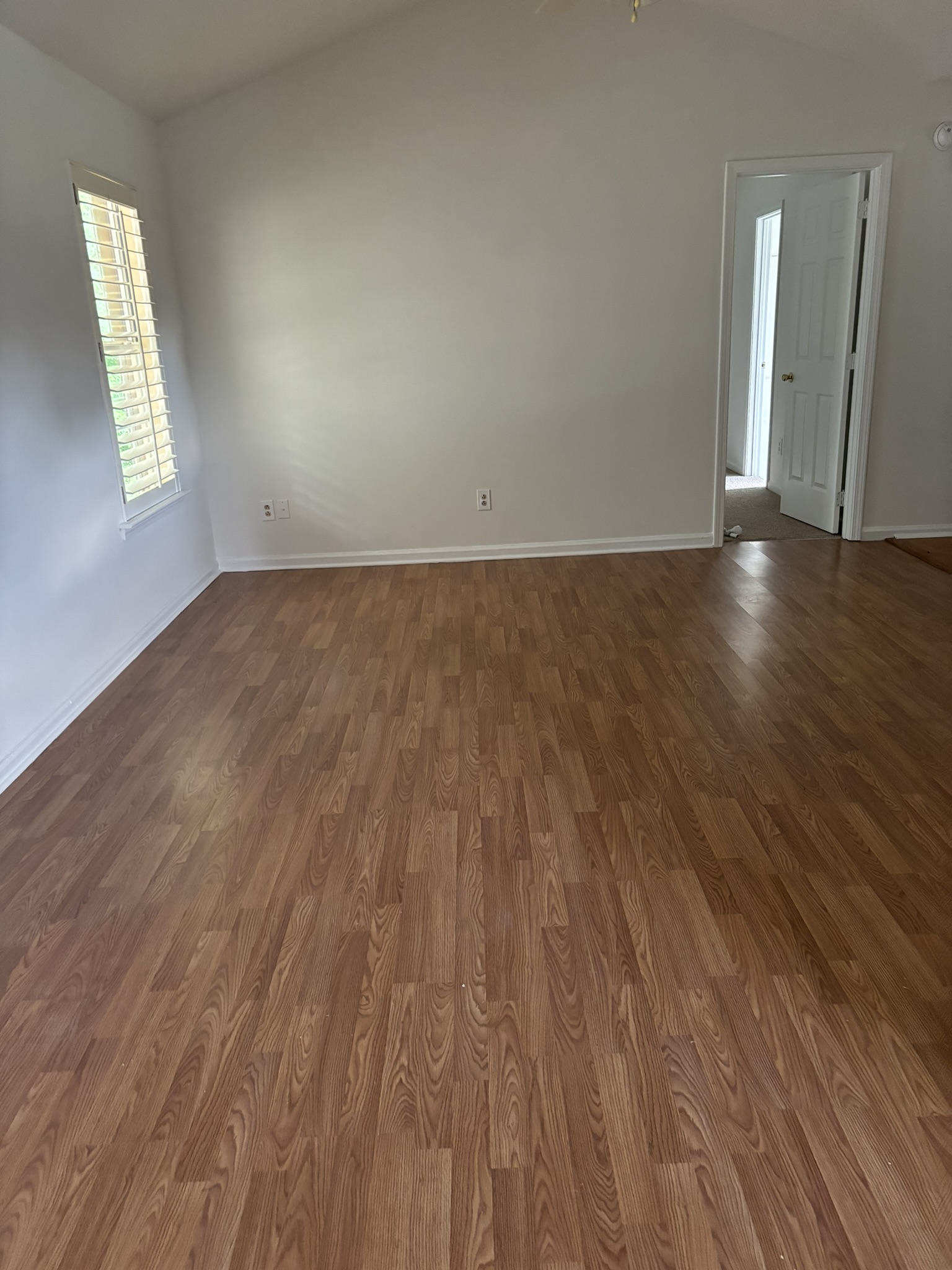 Gleaming Wood-Plank Floors & Baseboards