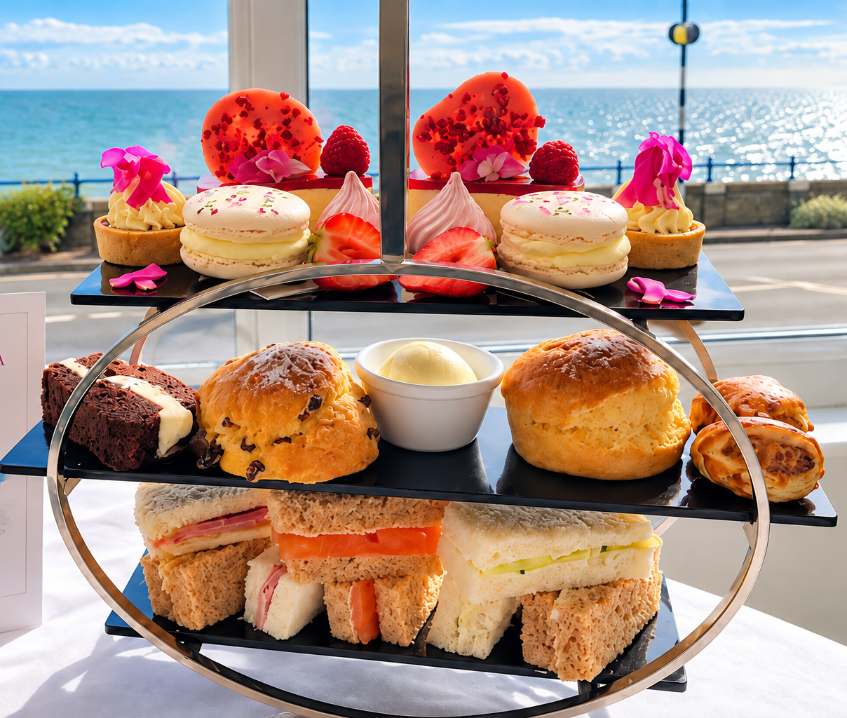 Langham Hotel Afternoon Tea overlooking Eastbourne seafront with 3 tiers of treats