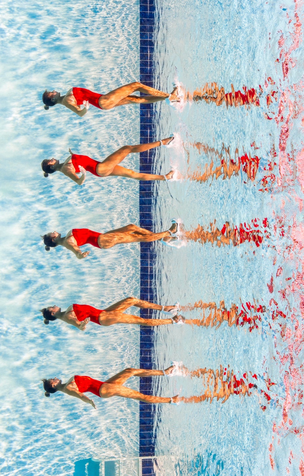 Kristina Makushenko's underwater moonwalk seen from above in a pool