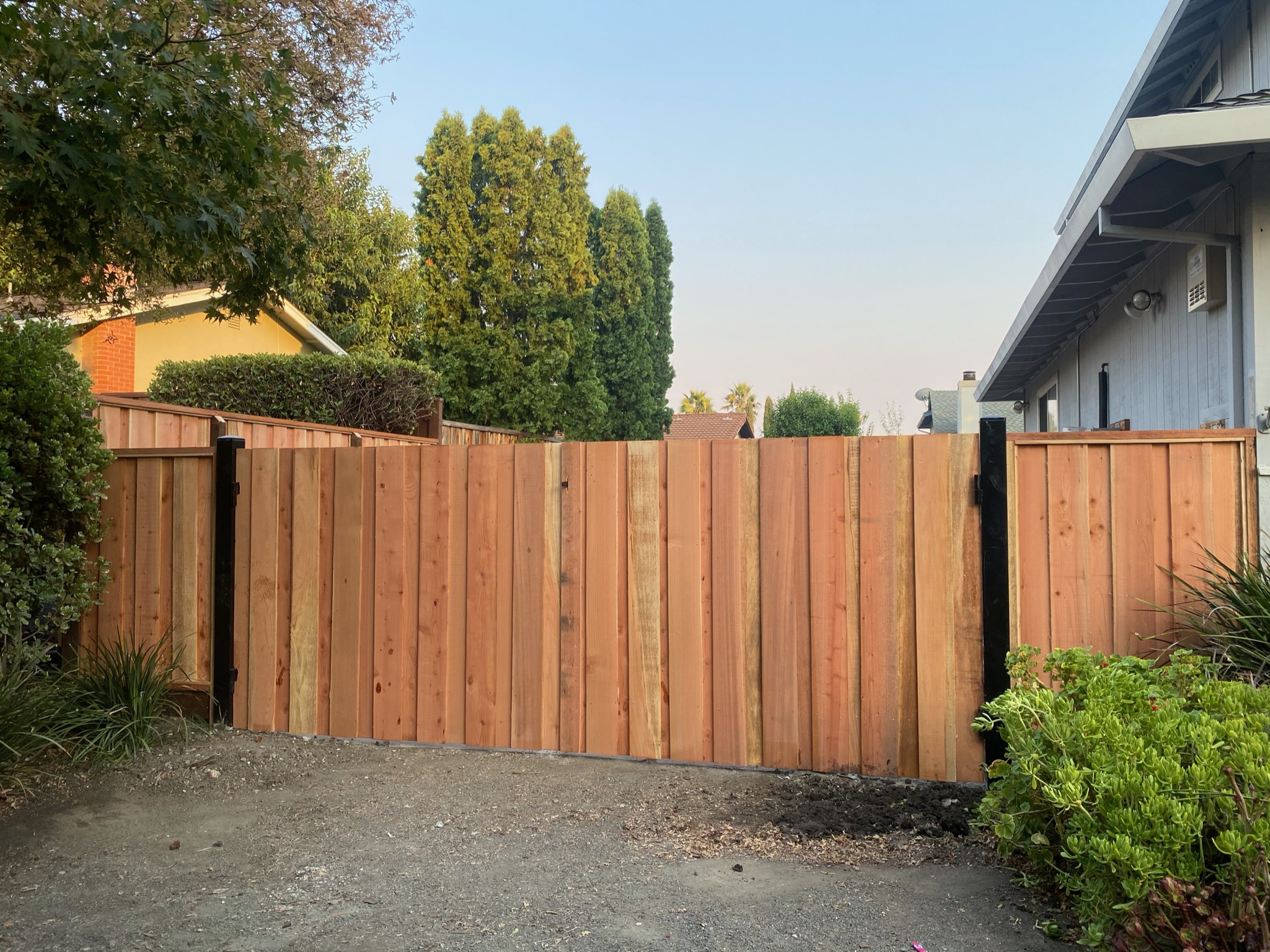 Heavy-Duty Redwood Double Driveway Gate with Steel Posts