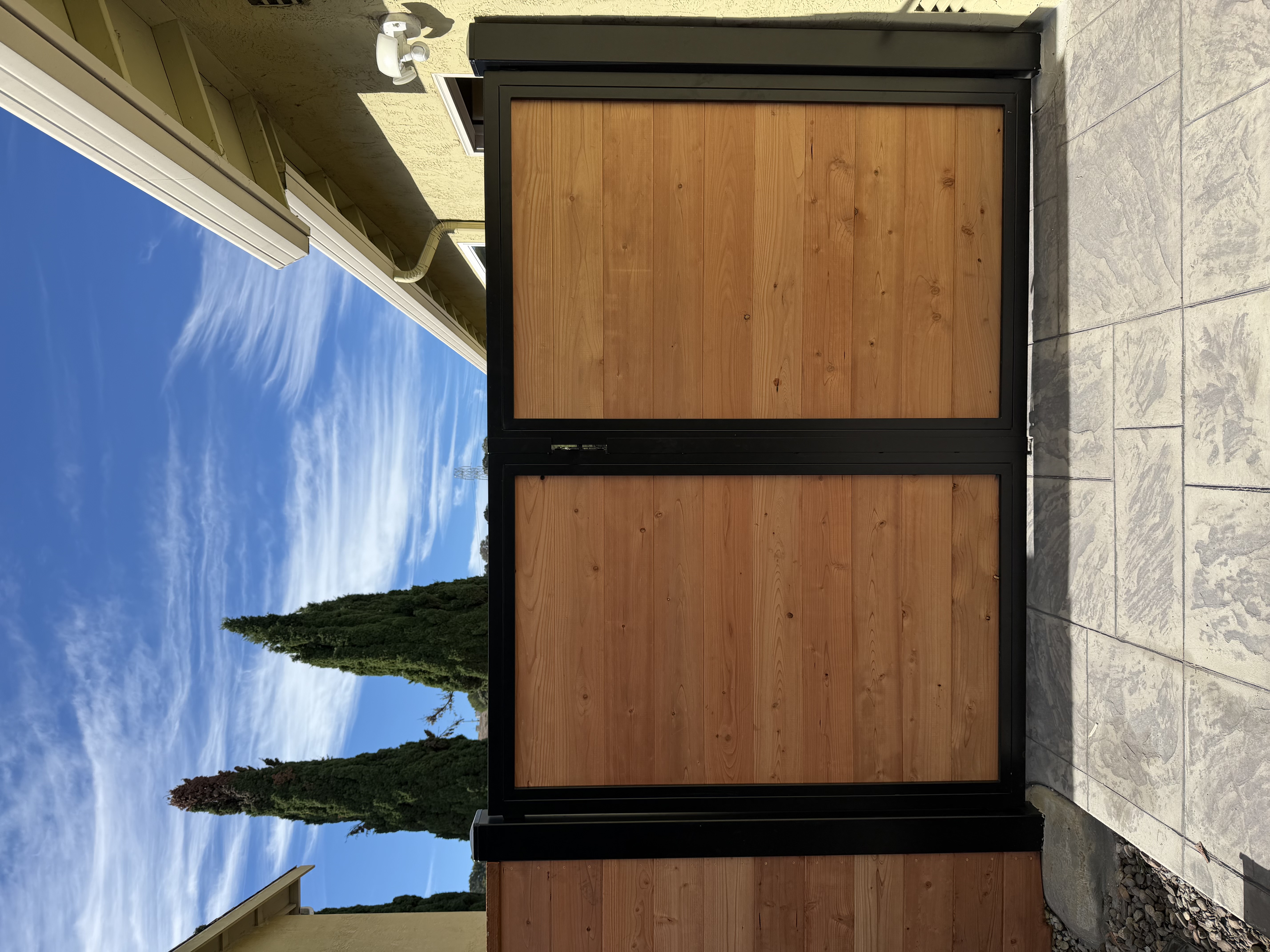 Custom Steel Framed Gate & Retaining Wall