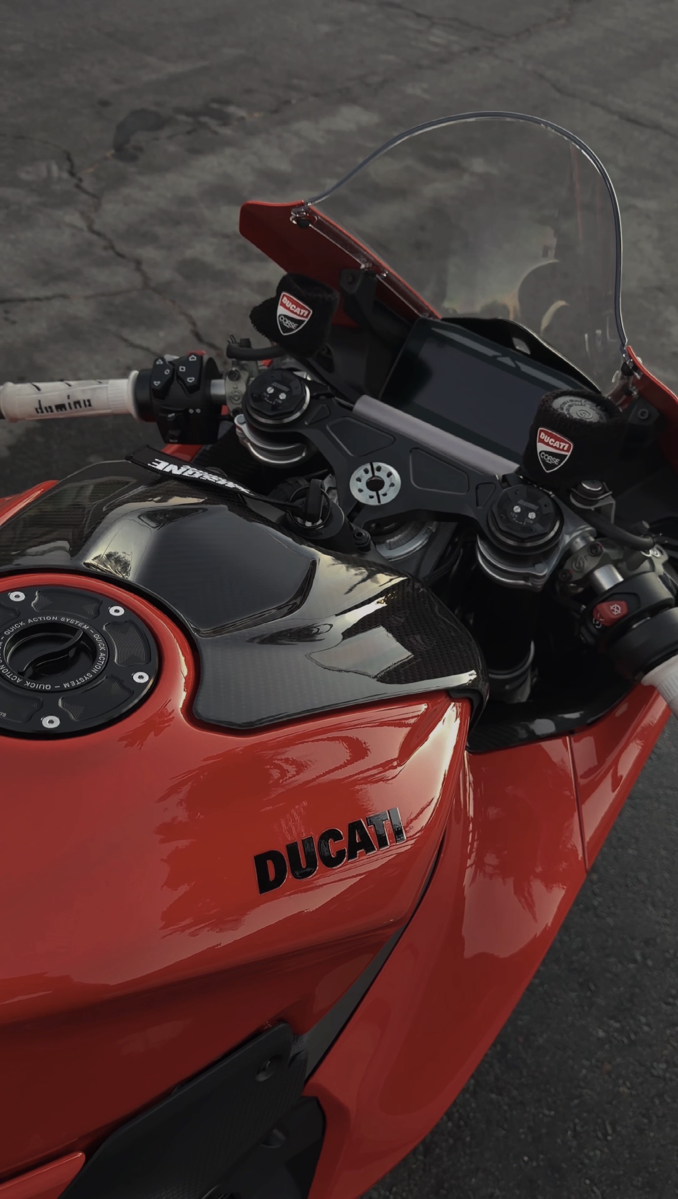 Ducati fuel tank and carbon fiber precision detail close up